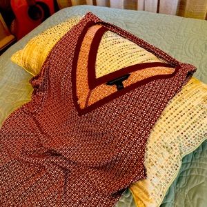 Sleeveless, V-neck blouse